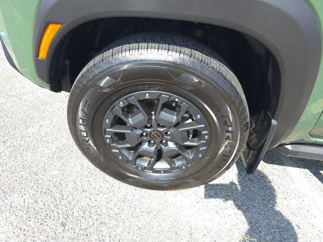 Photo of 2023 Tactical Green Metallic Nissan Frontier