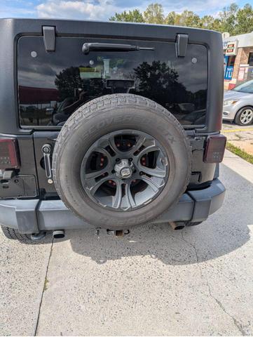 Photo of 2012 Black Clearcoat Jeep Wrangler Unlimited