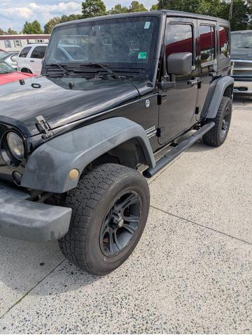 Photo of 2012 Black Clearcoat Jeep Wrangler Unlimited