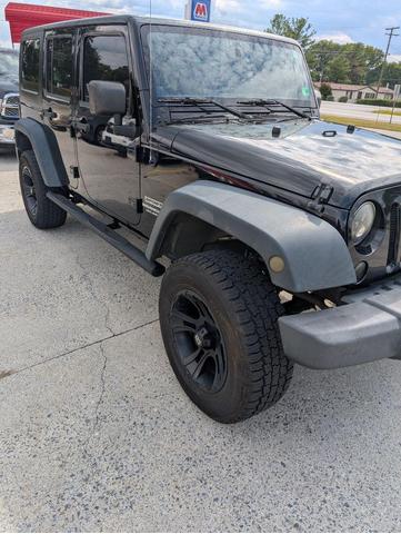 Photo of 2012 Black Clearcoat Jeep Wrangler Unlimited