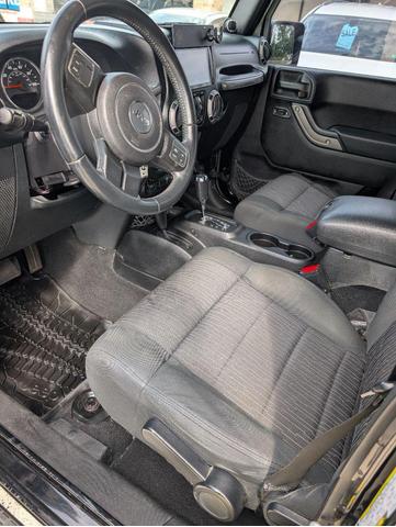 Photo of 2012 Black Clearcoat Jeep Wrangler Unlimited