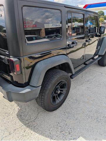 Photo of 2012 Black Clearcoat Jeep Wrangler Unlimited