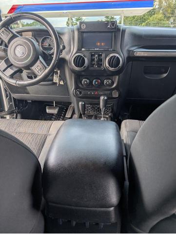 Photo of 2012 Black Clearcoat Jeep Wrangler Unlimited