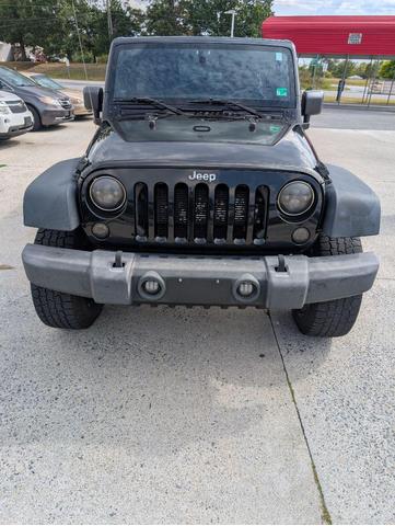 Photo of 2012 Black Clearcoat Jeep Wrangler Unlimited