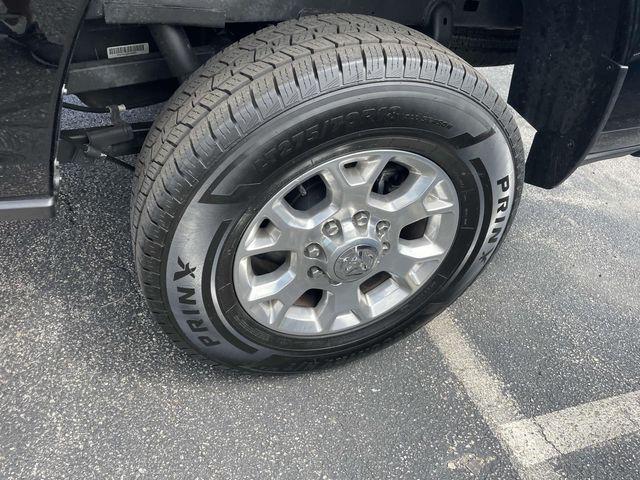 Photo of 2024 Diamond Black Crystal Pearlcoat RAM 2500