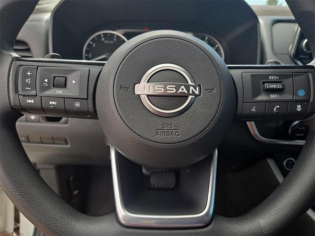 Photo of 2023 Pearl White Tricoat Nissan Rogue