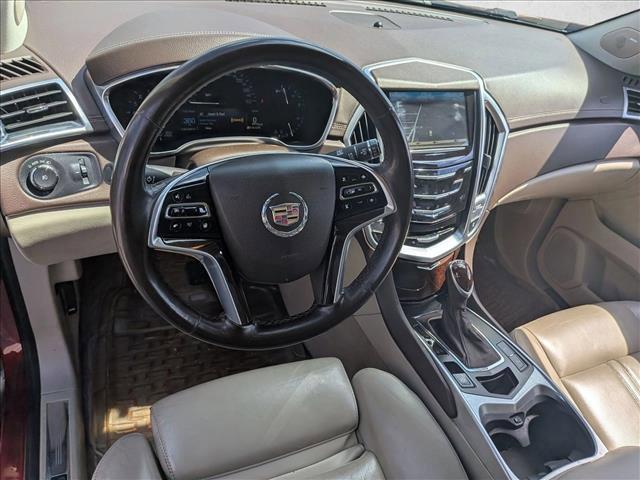 Photo of 2014 Crystal Red Tintcoat Cadillac SRX