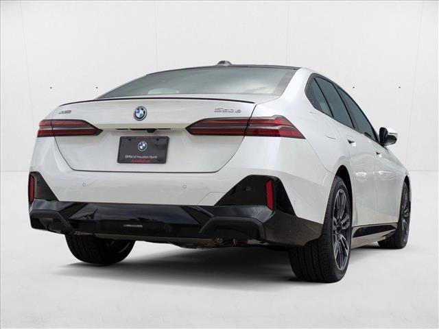 Photo of 2026 Mineral White Metallic BMW 550e