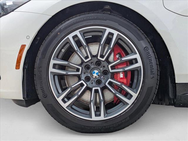 Photo of 2026 Mineral White Metallic BMW 550e
