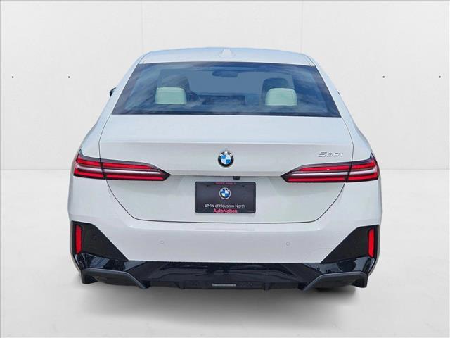 Photo of 2025 Alpine White BMW 530