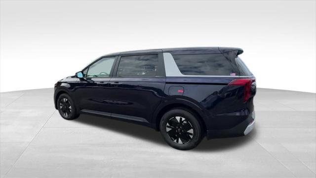 Photo of 2026 Deep Chroma Blue Kia Carnival Hybrid