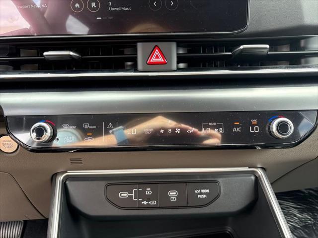 Photo of 2026 Deep Chroma Blue Kia Carnival Hybrid