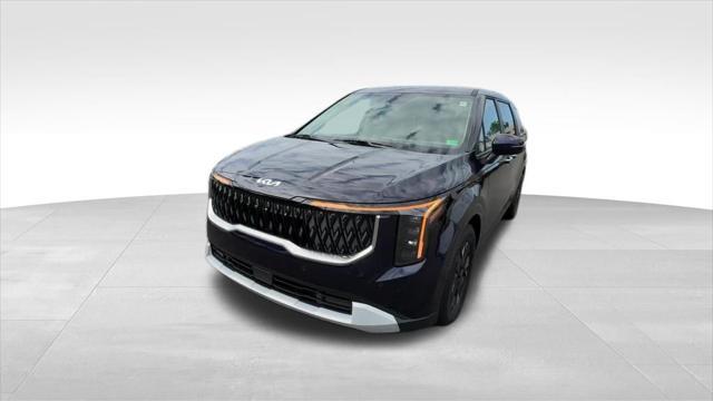 Photo of 2026 Deep Chroma Blue Kia Carnival Hybrid