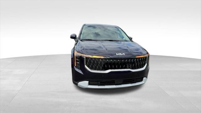 Photo of 2026 Deep Chroma Blue Kia Carnival Hybrid