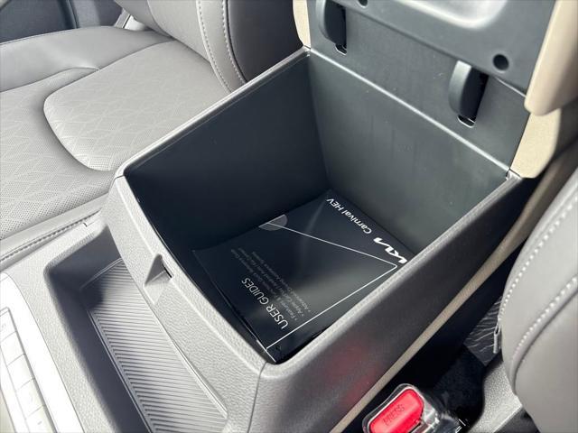 Photo of 2026 Deep Chroma Blue Kia Carnival Hybrid