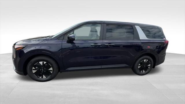 Photo of 2026 Deep Chroma Blue Kia Carnival Hybrid