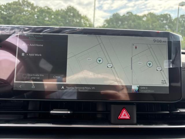 Photo of 2026 Deep Chroma Blue Kia Carnival Hybrid