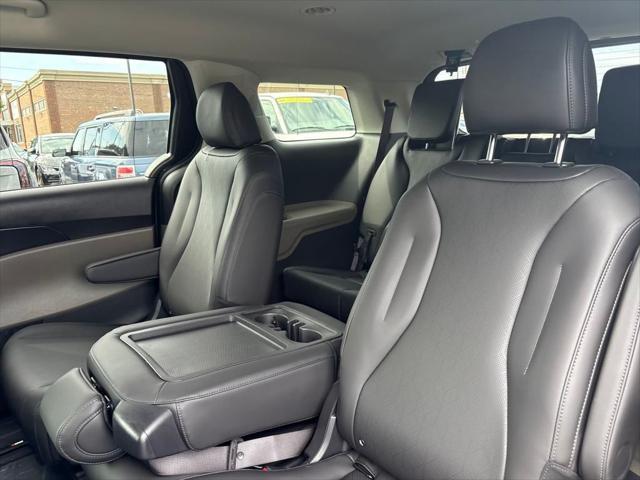 Photo of 2026 Deep Chroma Blue Kia Carnival Hybrid