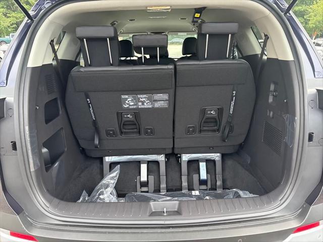Photo of 2026 Deep Chroma Blue Kia Carnival Hybrid