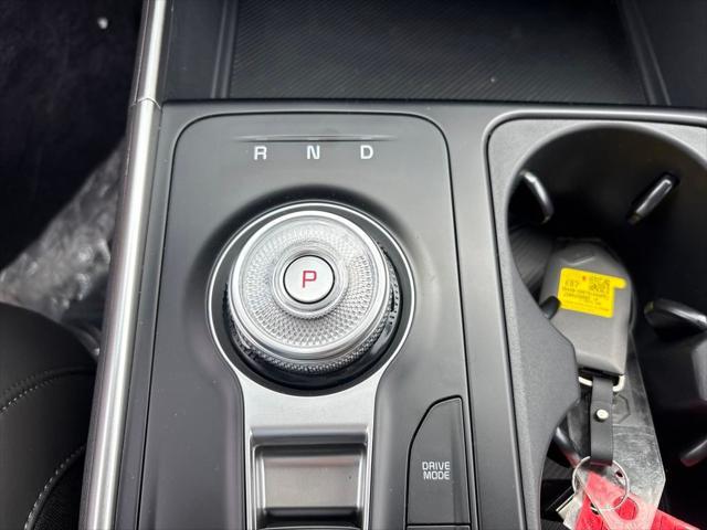 Photo of 2026 Deep Chroma Blue Kia Carnival Hybrid