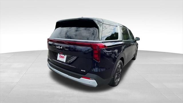 Photo of 2026 Deep Chroma Blue Kia Carnival Hybrid