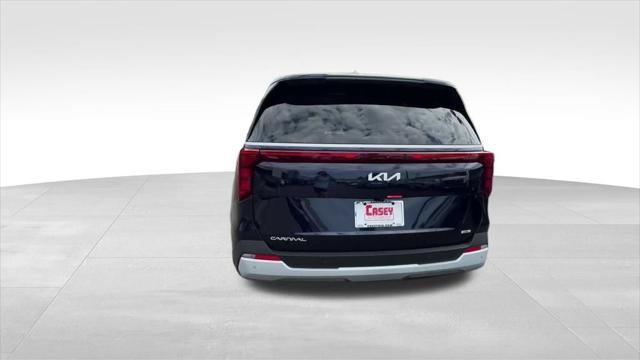Photo of 2026 Deep Chroma Blue Kia Carnival Hybrid