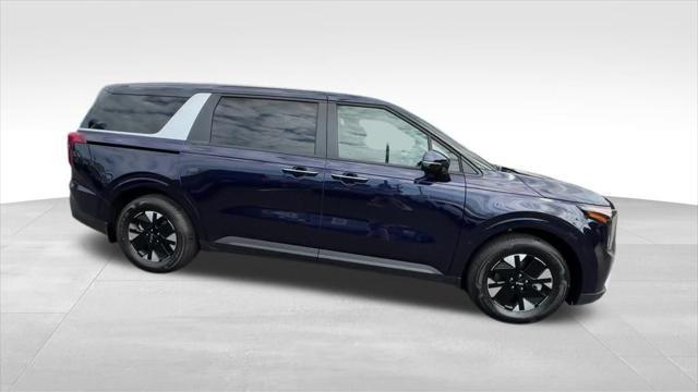 Photo of 2026 Deep Chroma Blue Kia Carnival Hybrid