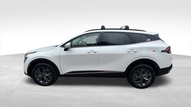 Photo of 2025 White Pearl Kia Sportage Hybrid