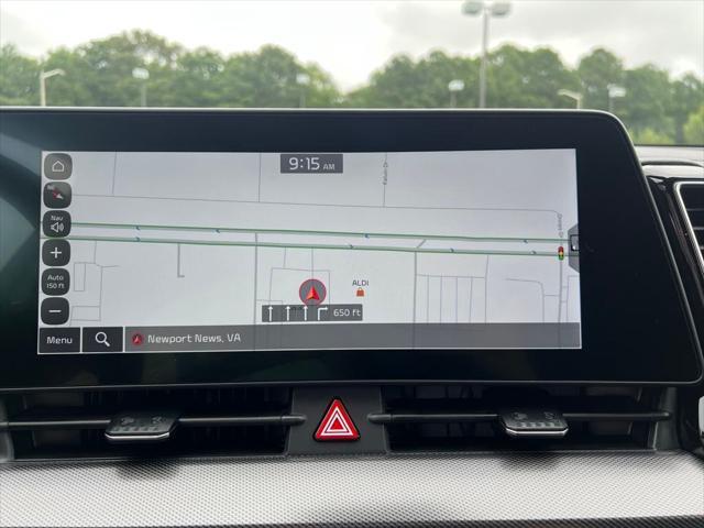 Photo of 2025 White Pearl Kia Sportage Hybrid
