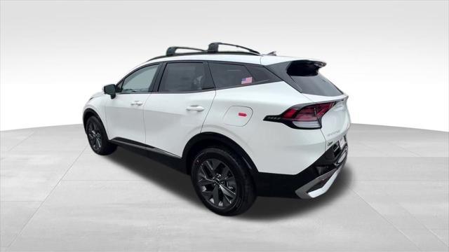 Photo of 2025 White Pearl Kia Sportage Hybrid