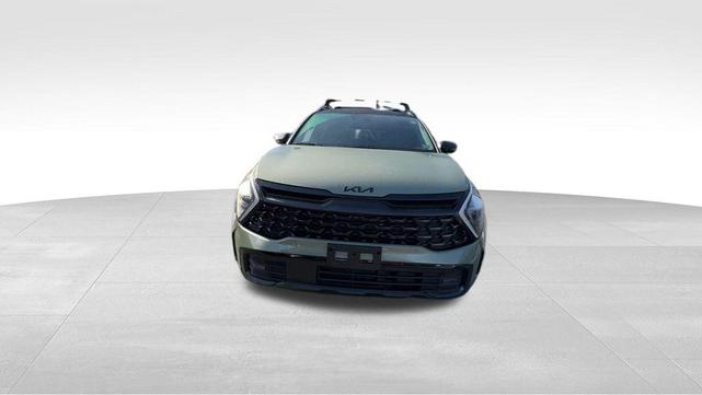 Photo of 2025 Jungle Green Kia Sportage