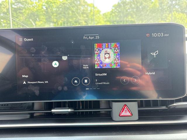 Photo of 2025 Aurora Blue Kia Carnival Hybrid
