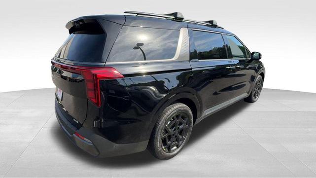 Photo of 2025 Aurora Blue Kia Carnival Hybrid