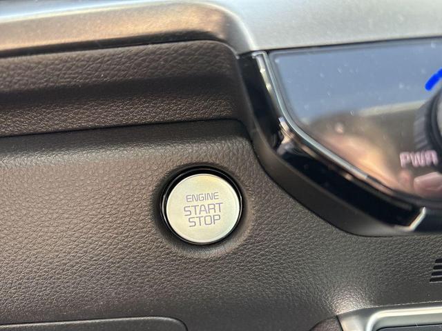Photo of 2025 Aurora Blue Kia Carnival Hybrid