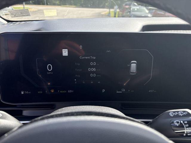 Photo of 2025 Aurora Blue Kia Carnival Hybrid