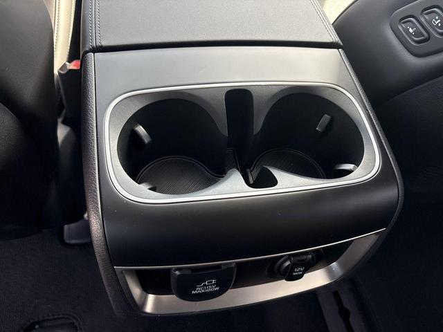 Photo of 2025 Aurora Blue Kia Carnival Hybrid