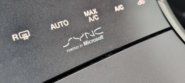 Photo of 2014 Sunset Metallic Lincoln MKZ