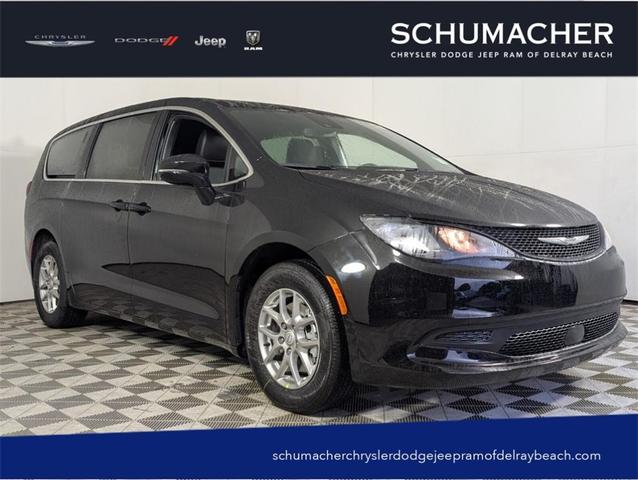 Photo of 2025 Diamond Black Chrysler Voyager