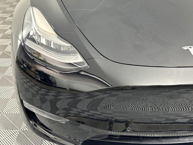 Photo of 2022 Solid Black Tesla Model Y