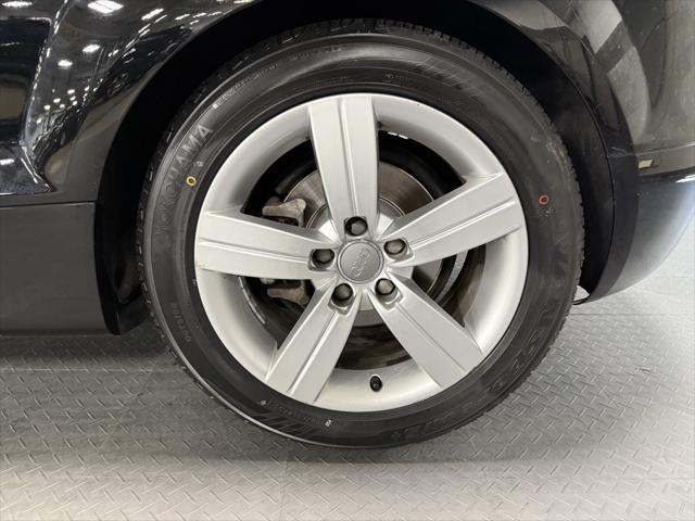 Photo of 2009 Brilliant Black/Black Roof Audi TT