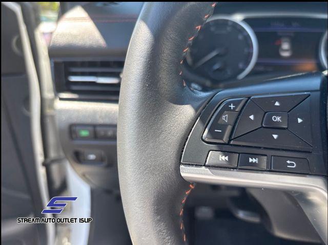 Photo of 2023 Aspen White Tricoat Nissan Sentra