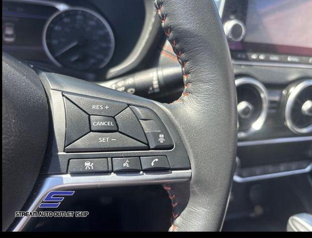 Photo of 2023 Aspen White Tricoat Nissan Sentra