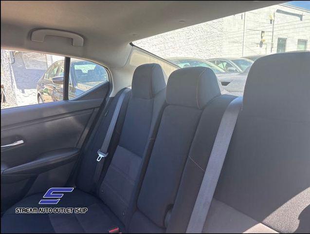 Photo of 2023 Aspen White Tricoat Nissan Sentra