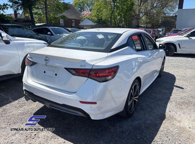 Photo of 2023 Aspen White Tricoat Nissan Sentra