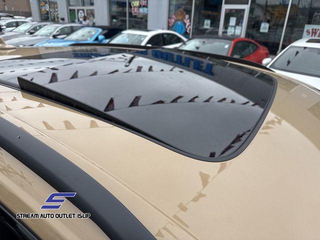 Photo of 2024 Gold Metallic Audi Q8