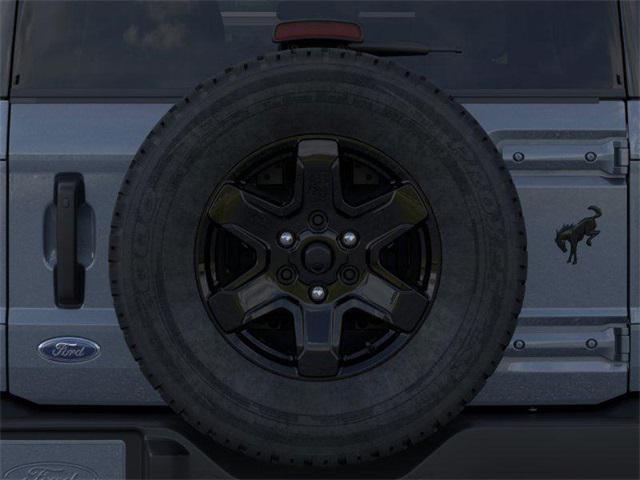 Photo of 2025 AZURE GRAY MET TRI-COAT Ford Bronco