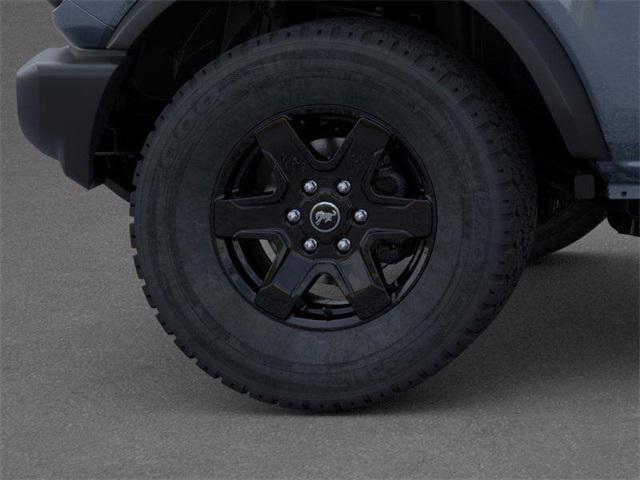 Photo of 2025 AZURE GRAY MET TRI-COAT Ford Bronco