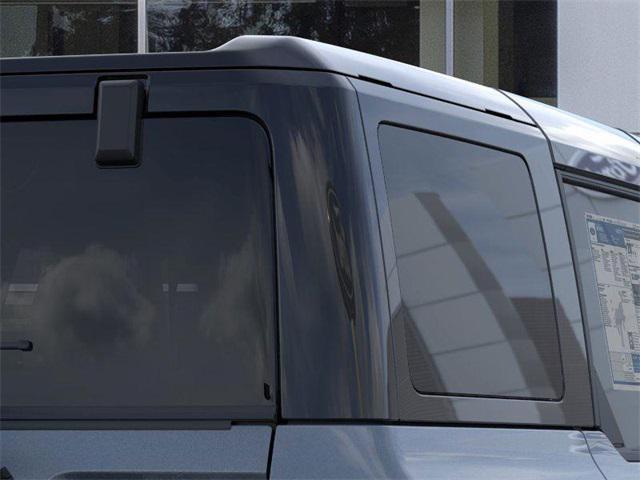 Photo of 2025 AZURE GRAY MET TRI-COAT Ford Bronco