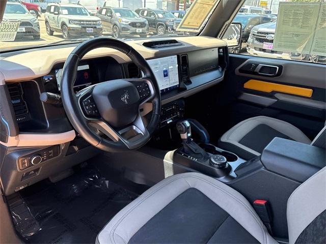 Photo of 2022 CYBER ORANGE MET TRI-COAT Ford Bronco