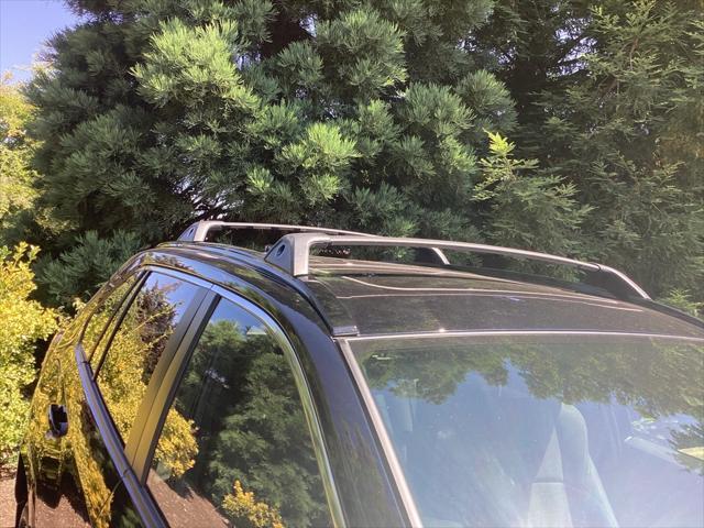 Photo of 2025 Midnight Black Metallic Toyota RAV4 Hybrid